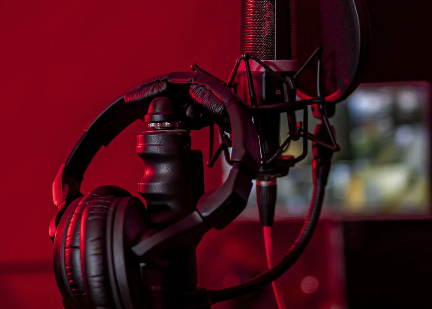 Headphones beside a studio microphone