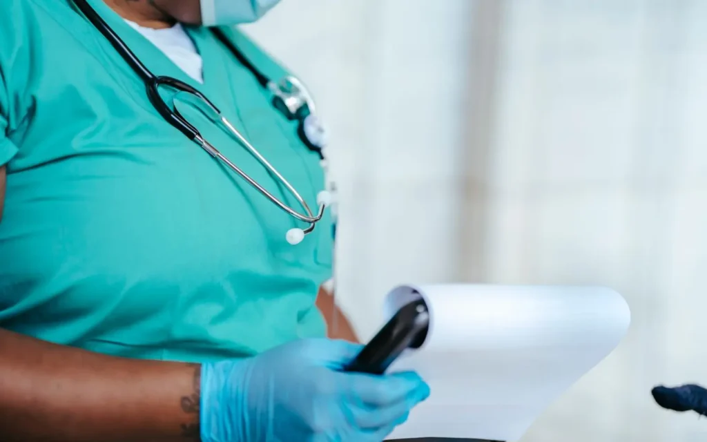Healthcare professional selecting relevant notes for a clinical letter