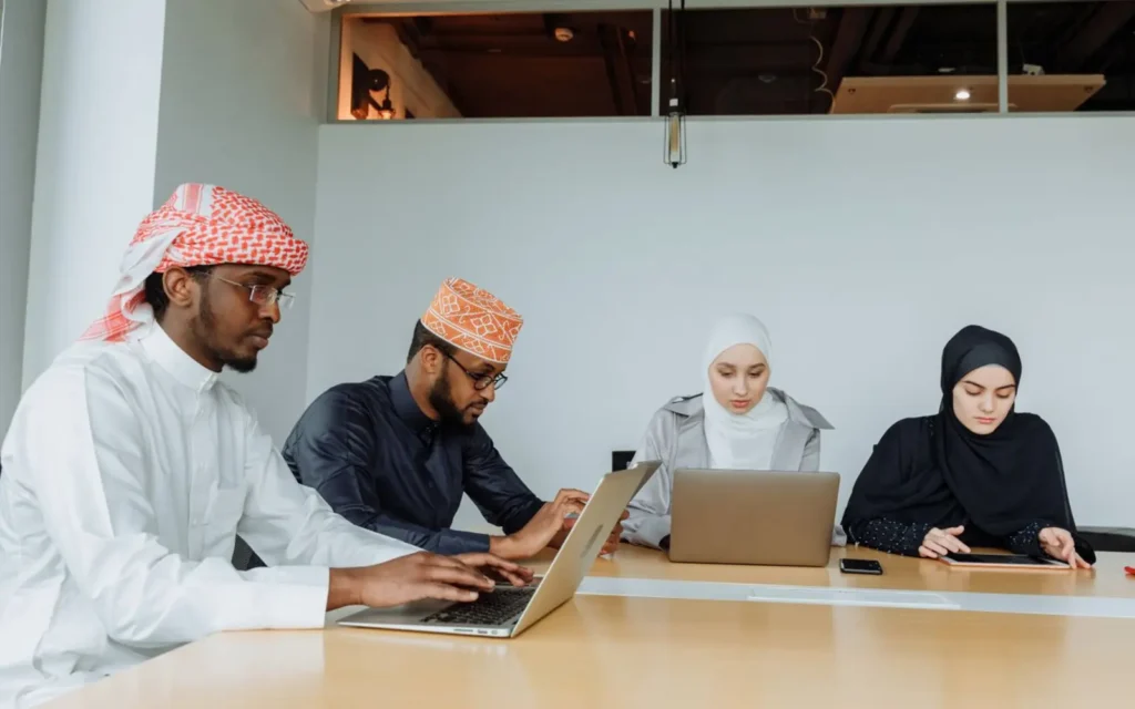 Middle Eastern colleagues working together in a modern office