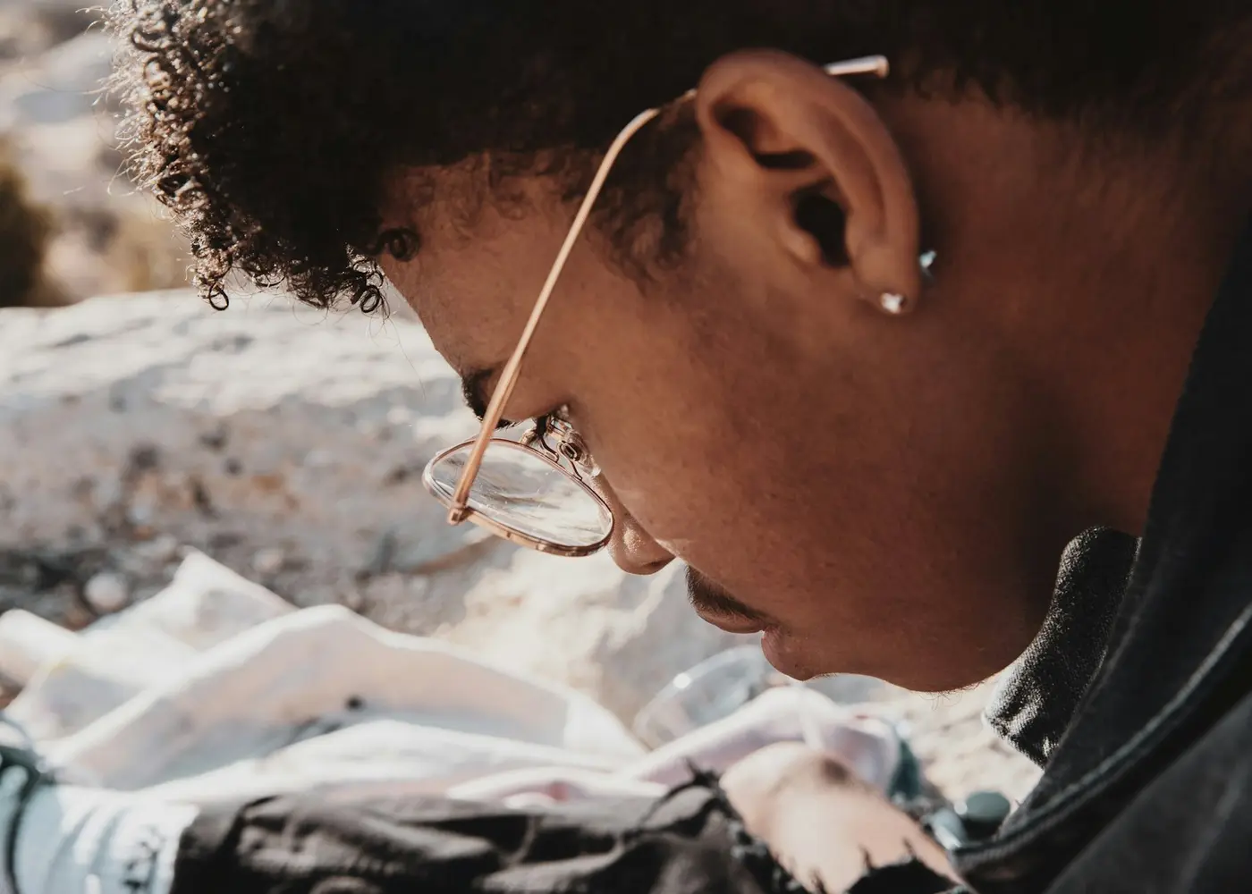University learner reading a book